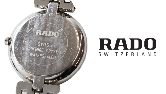 Dấu khắc dập mặt sau đồng hồ Rado